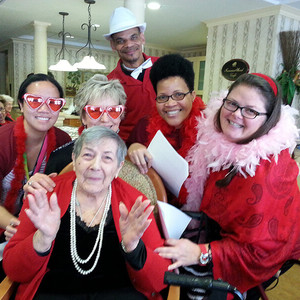 bertha and staff wearing red